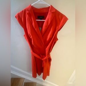 J.Crew dress.  Color burnt orange size 0.  Tie at waist with pockets.  With Tags